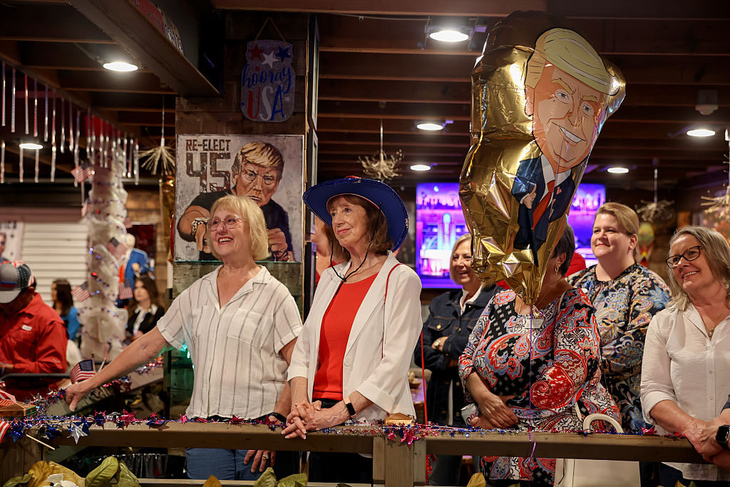 Supporters listen to Florida Republican Randy Fine speak yesterday. Credit: Getty