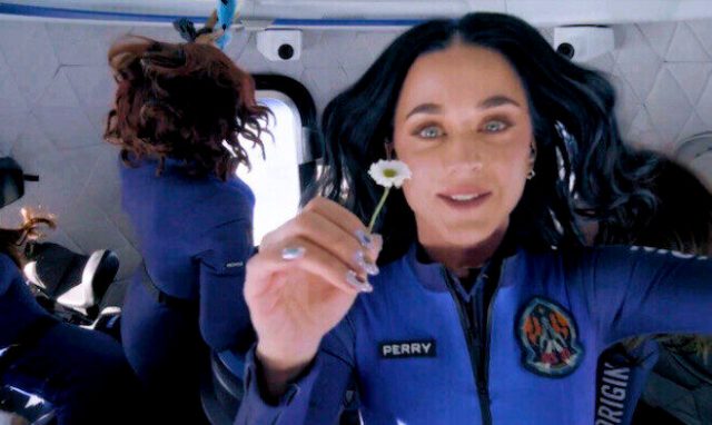 Katy Perry is pointing us to the Moon