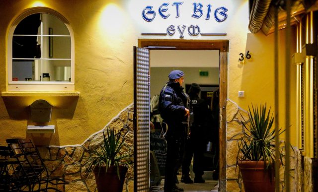 Police search an Italian restaurant in Pulheim, Germany. Sascha Steinbach/EPA-EFE/Shutterstock.