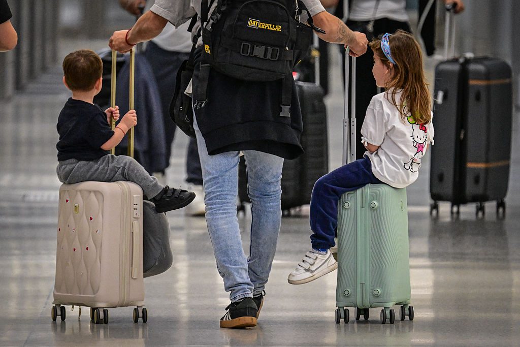 Some unruly passengers prepare to board their flight. Credit: Getty