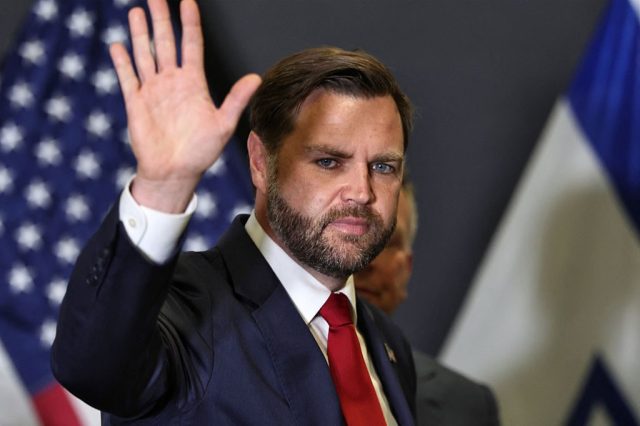 JD Vance does a balancing act. Credit: Getty