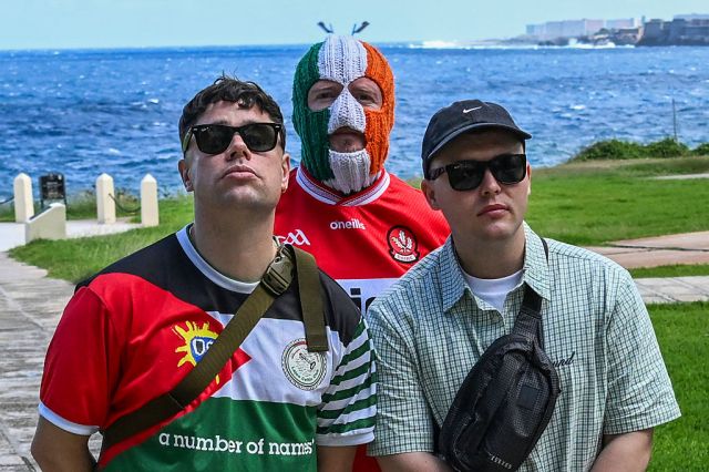 Moglai Bap, DJ Provai and Mo Chara of the Irish band Kneecap pose in Cuba last week. Credit: Getty