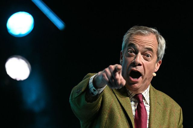 Nigel Farage spots another potential Tory defector. Credit: Getty