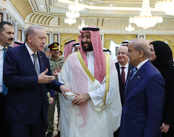 Turkish President Recep Tayyip Erdoğan, Saudi Crown Prince Mohammed bin Salman and Pakistani Prime Minister Shehbaz Sharif sign the trilateral joint defence agreement in Mecca yesterday. Credit: Getty